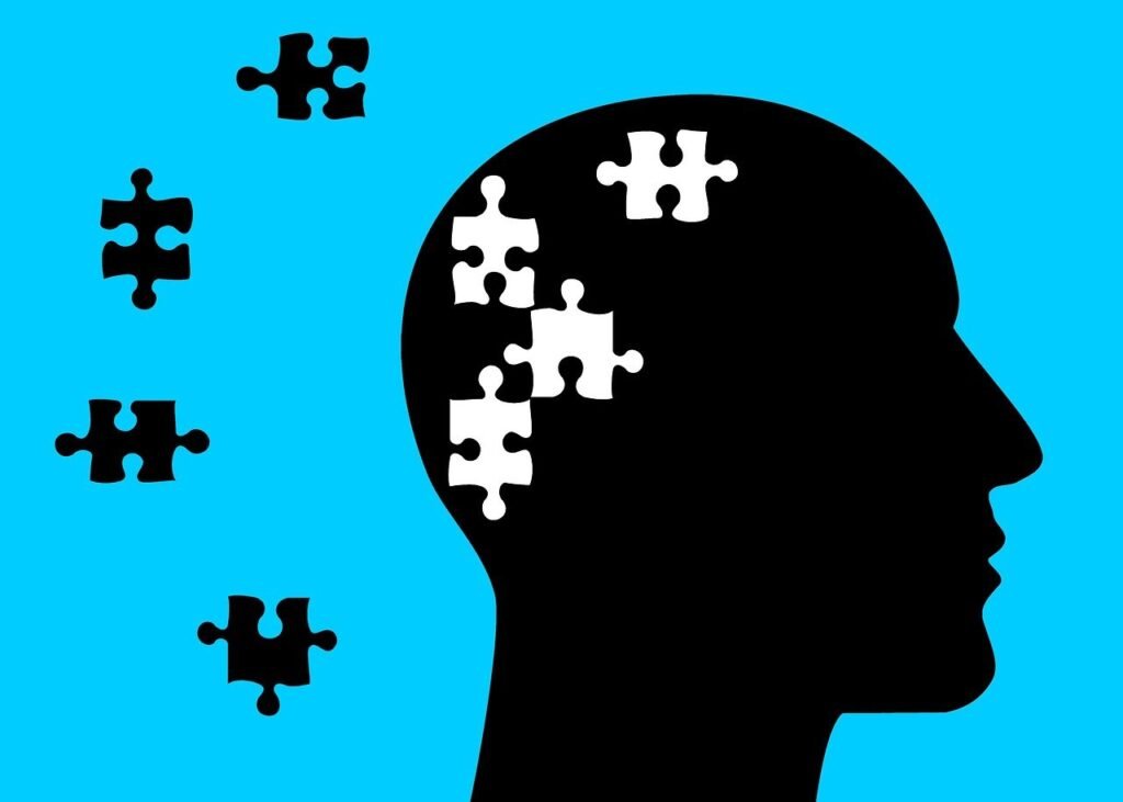 Brain puzzle with blue screen describes vitamins for mental health