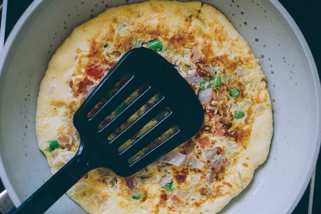 Omelet with mushrooms and tomatoes and turkey fume for no sugar diet