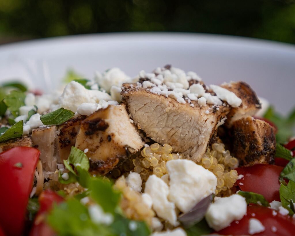 Roasted chicken with quinoa and a rainbow of roasted veggies