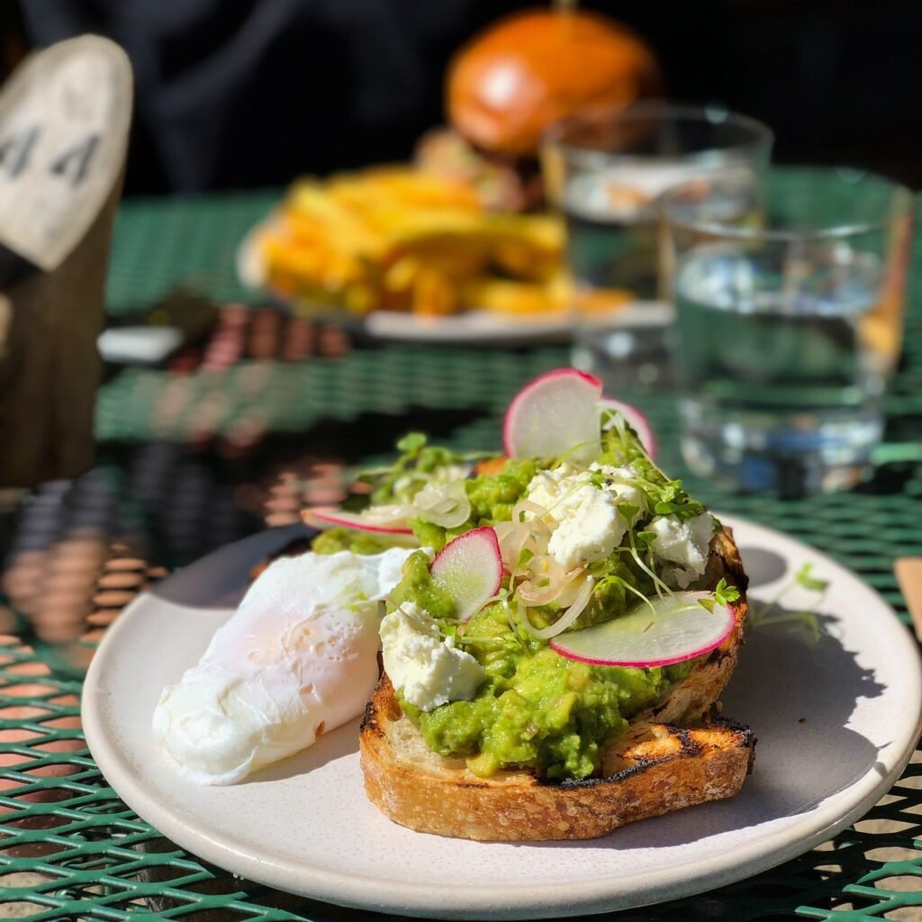 Avocado and poached eggs on wholemeal toast.