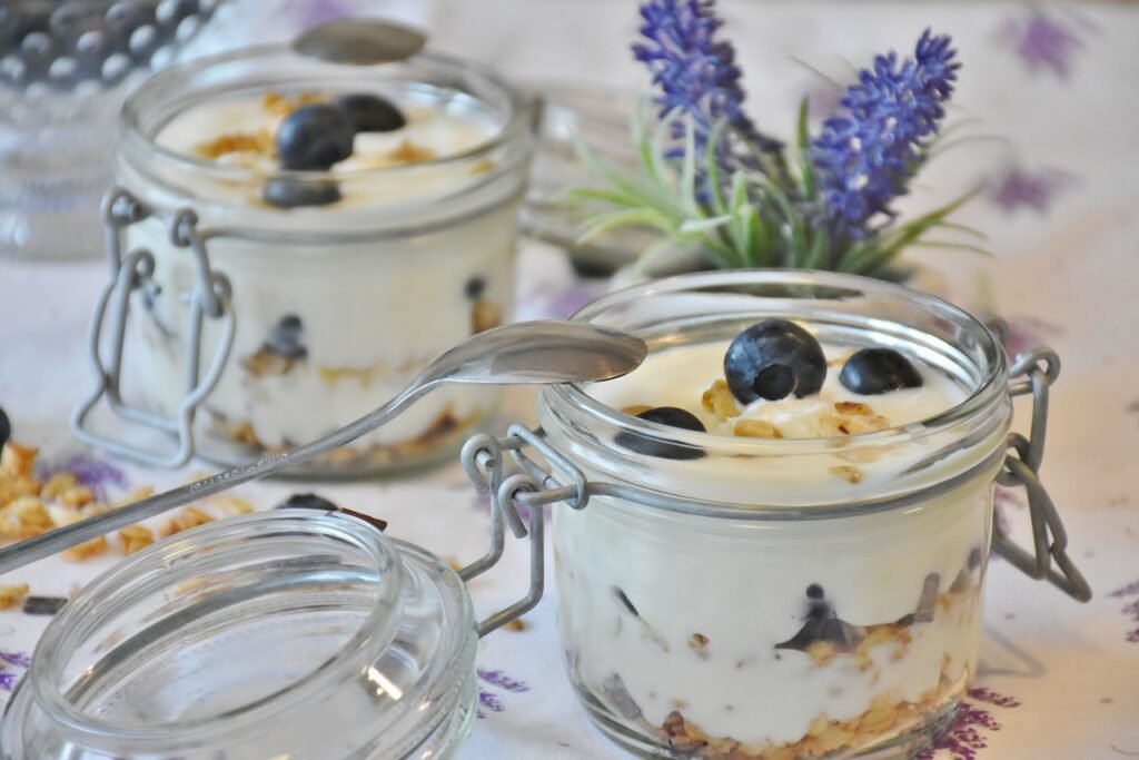 Greek yoghurt topped with fresh berries and a handful of mixed seeds